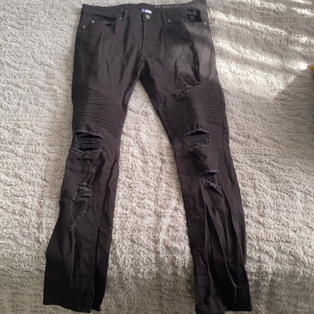 Black rippled/ripped jeans